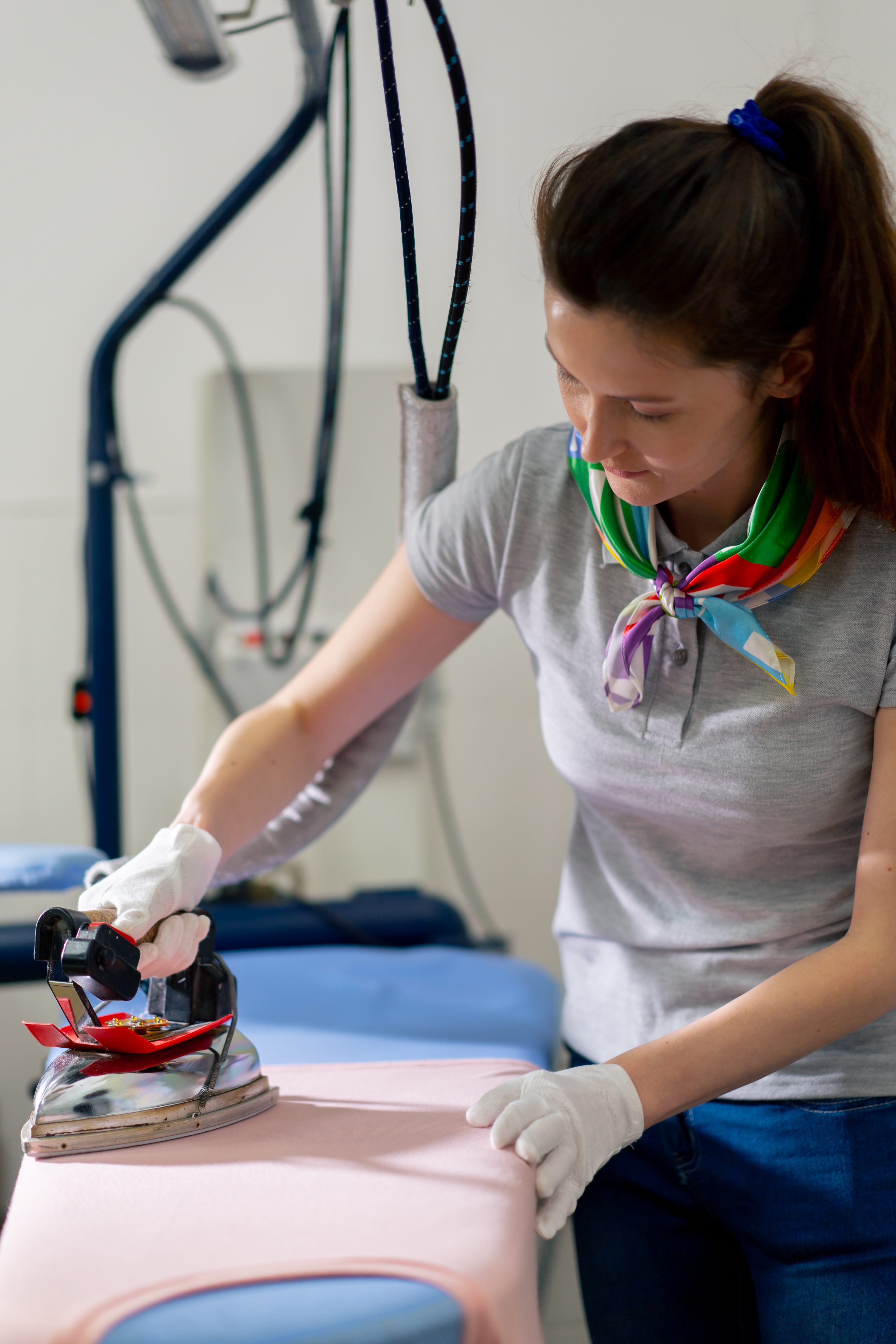 Person ironing clothes